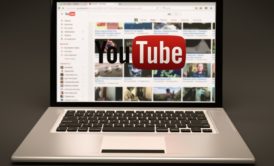 youtube on silver laptop