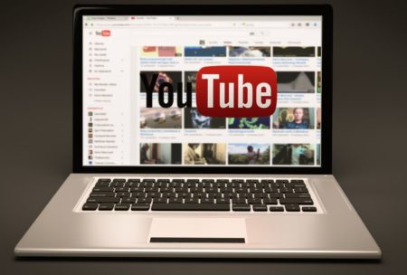 youtube on silver laptop