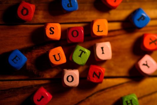 letter blocks spelling out the word solution