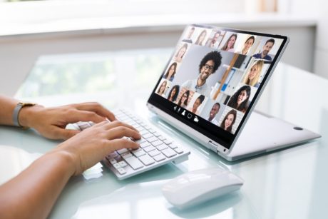 white convertible desktop computer with webinar on display