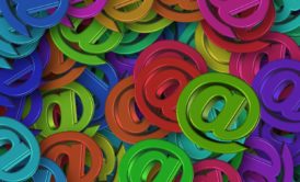 multi-colored at signs for email in business communication