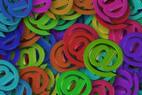 multi-colored at signs for email in business communication