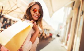 woman carrying shopping bags