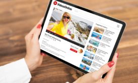 woman opening you tube through tablet device