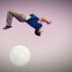 male gymnast jumping over the moon