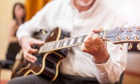 man playing jazz guitar