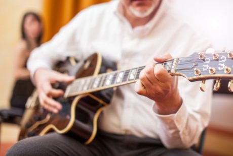 man playing jazz guitar