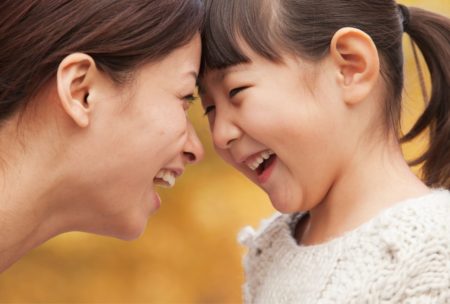 happy parent and daughter