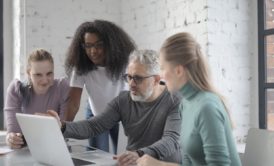 project manager discussing with team members