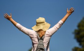 woman raising hands