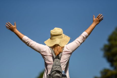 woman raising hands