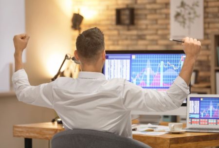 stock market investor in white shirt