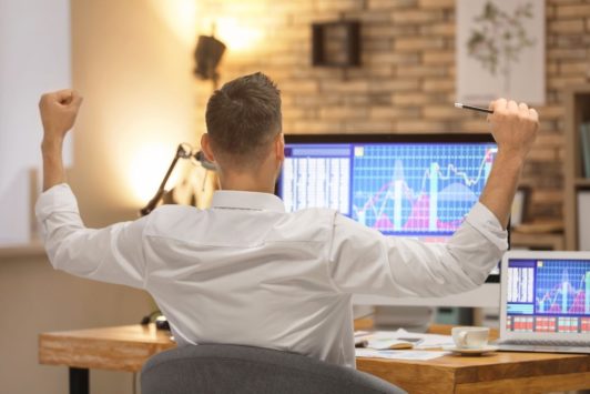 stock market investor in white shirt