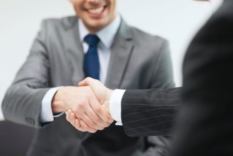 referral sales person shaking hands