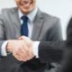 referral sales person shaking hands