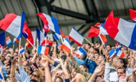 people waving french flag