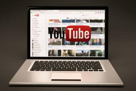 youtube on silver laptop