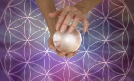 hands holding crystal ball