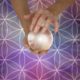 hands holding crystal ball