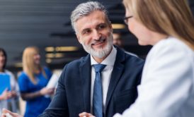 man talking to woman building trust and rapport