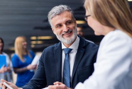 man talking to woman building trust and rapport