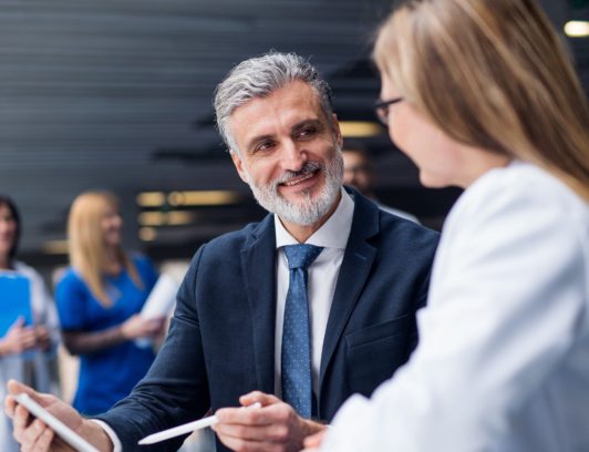 man talking to woman building trust and rapport