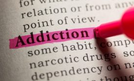 addiction highlighted in dictionary