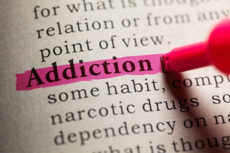 addiction highlighted in dictionary