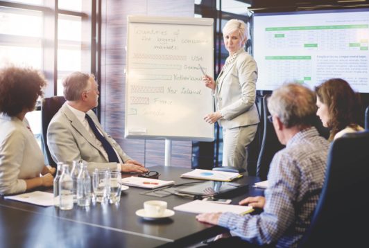 woman making presentation to team