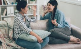 two women having conversation in korean