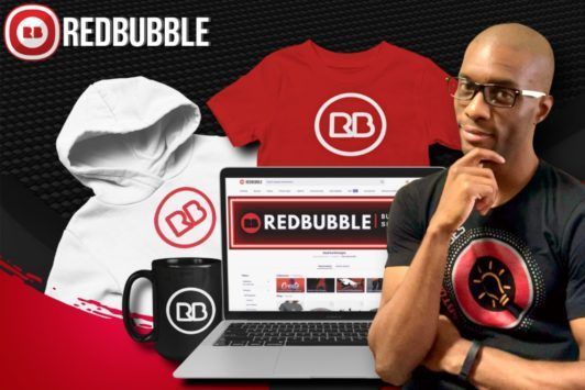 a laptop displaying Redbubble course, surrounded by various clothing items like t-shirts and hoodies