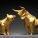 a gold bull and bear on a black background, illustrating the concept of defensive stock investing
