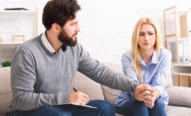 Male Counsellor Performing Dialectical Behavioral Therapy To A Female Patient