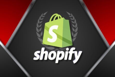Shopify logo on red and black background, representing Shopify website development