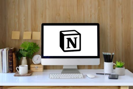 Notion logo on computer screen, displaying code. Learn how to use Notion for efficient organization