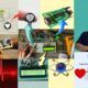 a collage of electronic devices including a heart beat monitor, showcasing the diversity of modern technology