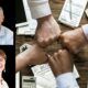 hands in unity of a diverse group of individuals, symbolizing collaboration and conflict management skills