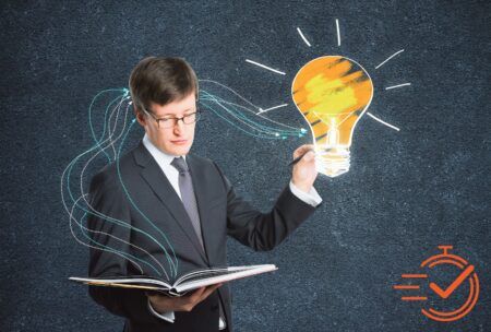 man in suit with book and light bulb, representing creativity and innovation