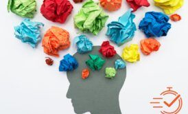 A head filled with crumpled colored paper, illustrating the struggle to enhance mental endurance and clarity.