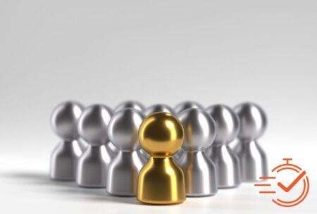 A golden person contrasts sharply with silver figures, illustrating the distinctive role of an accidental manager in a group