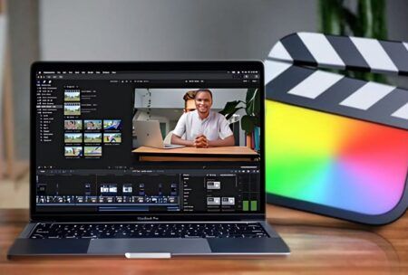 A laptop running Final Cut Pro X video editor, highlighting the editing timeline and tool options for video production.