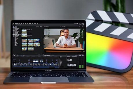 A laptop running Final Cut Pro X video editor, highlighting the editing timeline and tool options for video production.