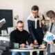 a scene of business people working together, emphasizing strategies on how to hold their team accountable effectively