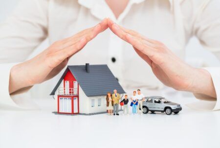 A house and car illustrate the need for home and car insurance to protect family assets.