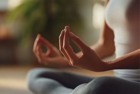 a woman in a yoga pose, radiating peace and a calm mind