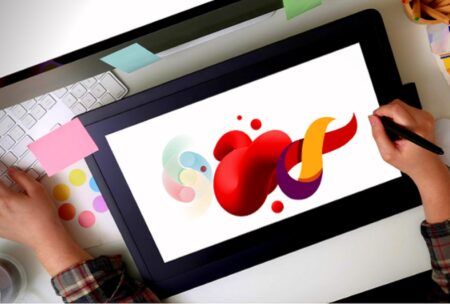 a person drawing a heart on a tablet, illustrating a lesson from a canva course