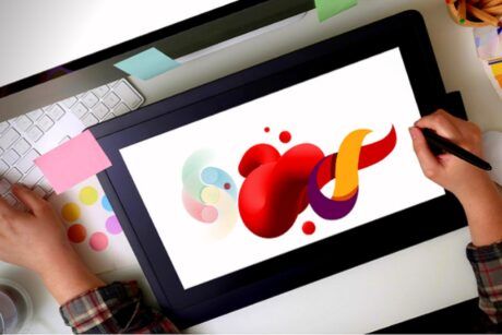 a person drawing a heart on a tablet, illustrating a lesson from a canva course