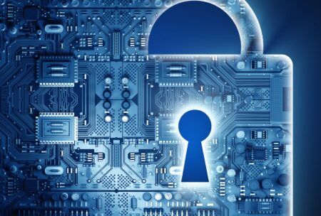 a blue padlock on a circuit board, symbolizing security in an introduction to cybersecurity