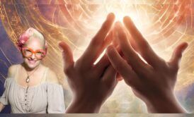 a woman with glasses and hands in the background, demonstrating a usui reiki technique in a calm setting