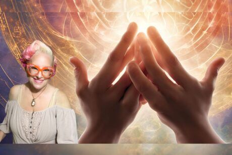 a woman with glasses and hands in the background, demonstrating a usui reiki technique in a calm setting